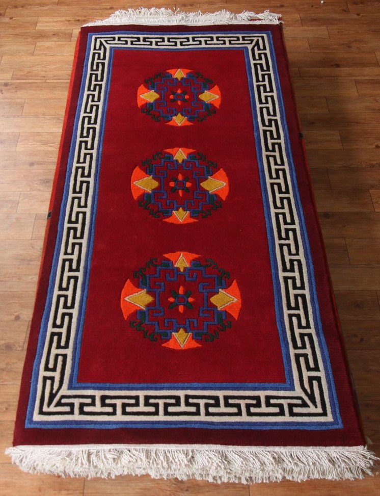 Tibetan-Carpet-with-3-Coins-and-Border